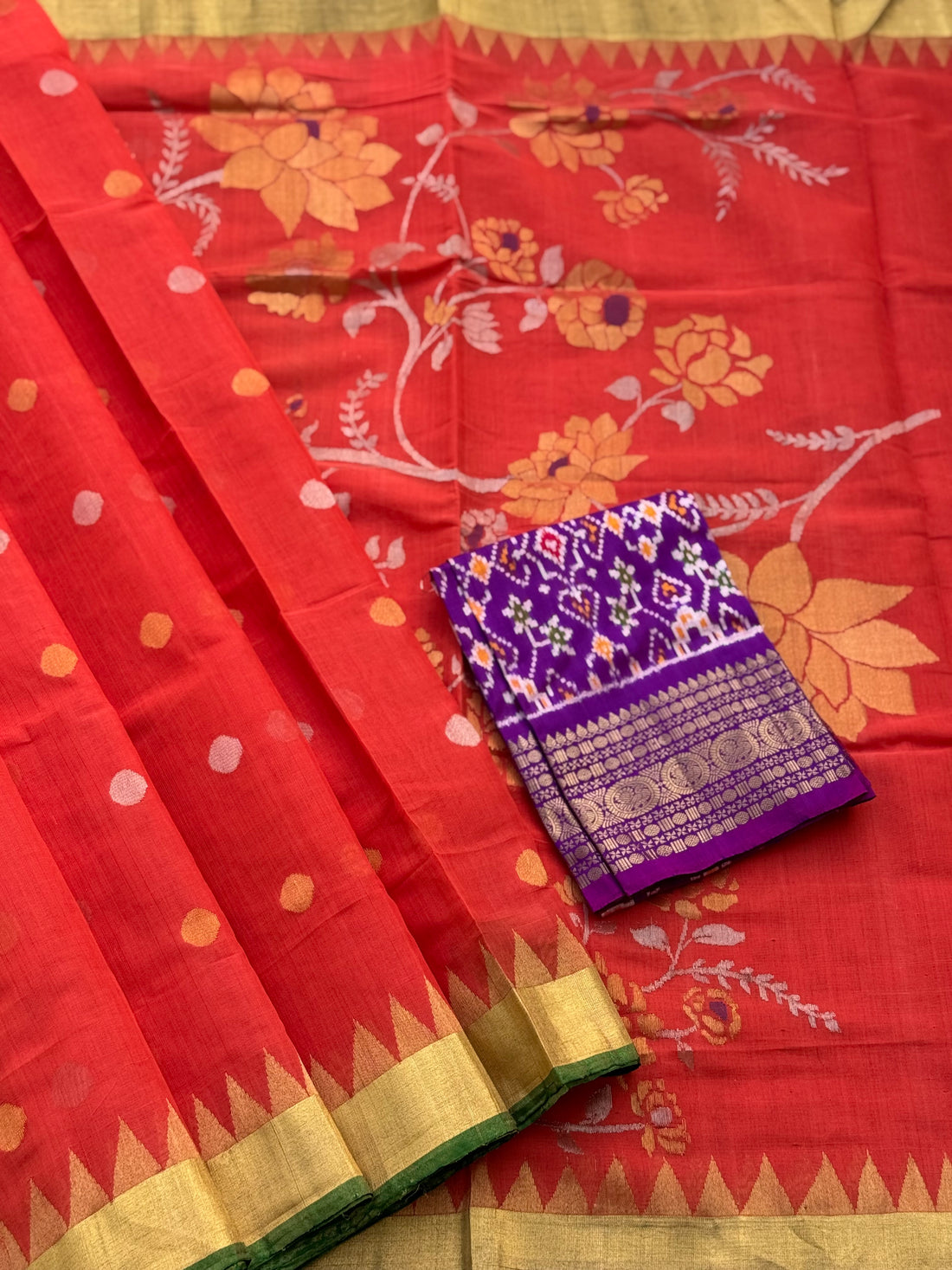 A gorgeous handspun ponduru Khadhi jamdani cotton saree in burnt orange