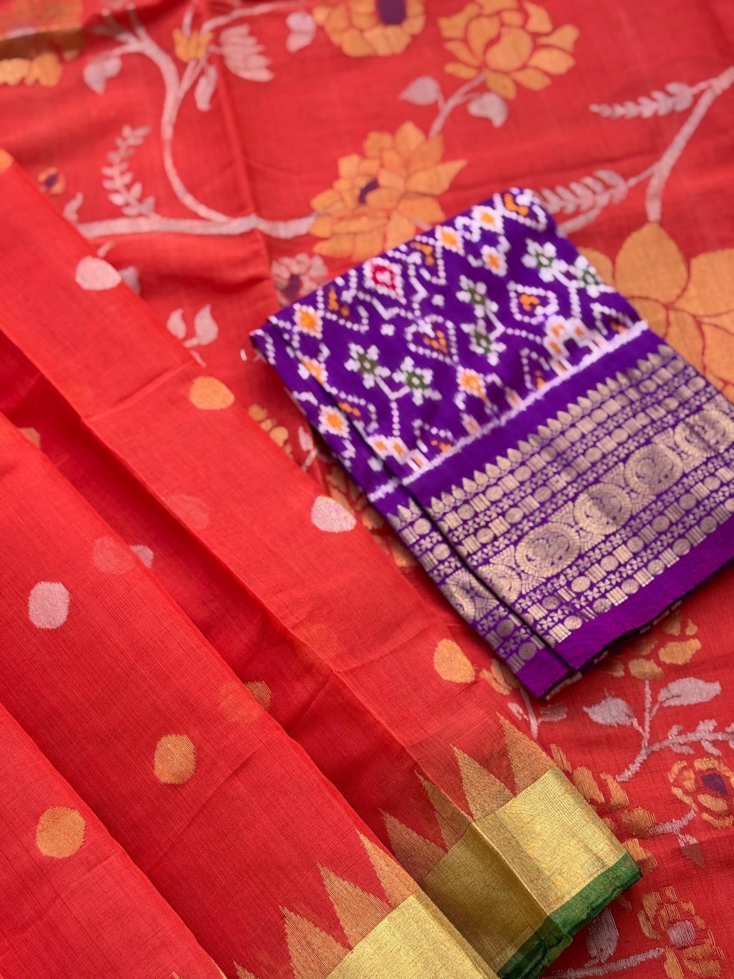 A gorgeous handspun ponduru Khadhi jamdani cotton saree in burnt orange