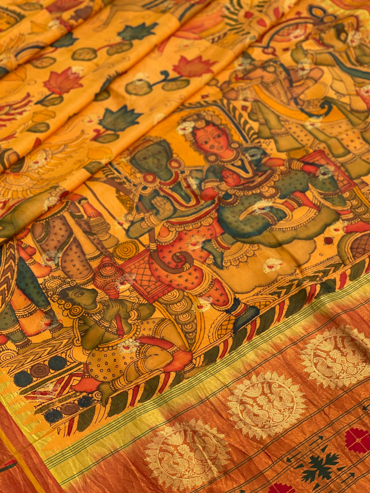 Handdrawn And HandPainted Penkalamkari In pastel yellow Paithani Silk Saree