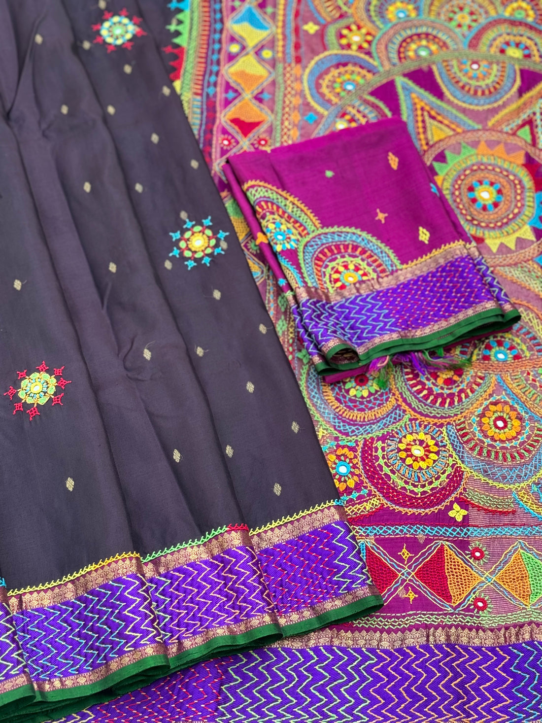 handwoven pure kanchivaram silk saree with korvai borders adorned with an exquisite handmade lambani mirror work