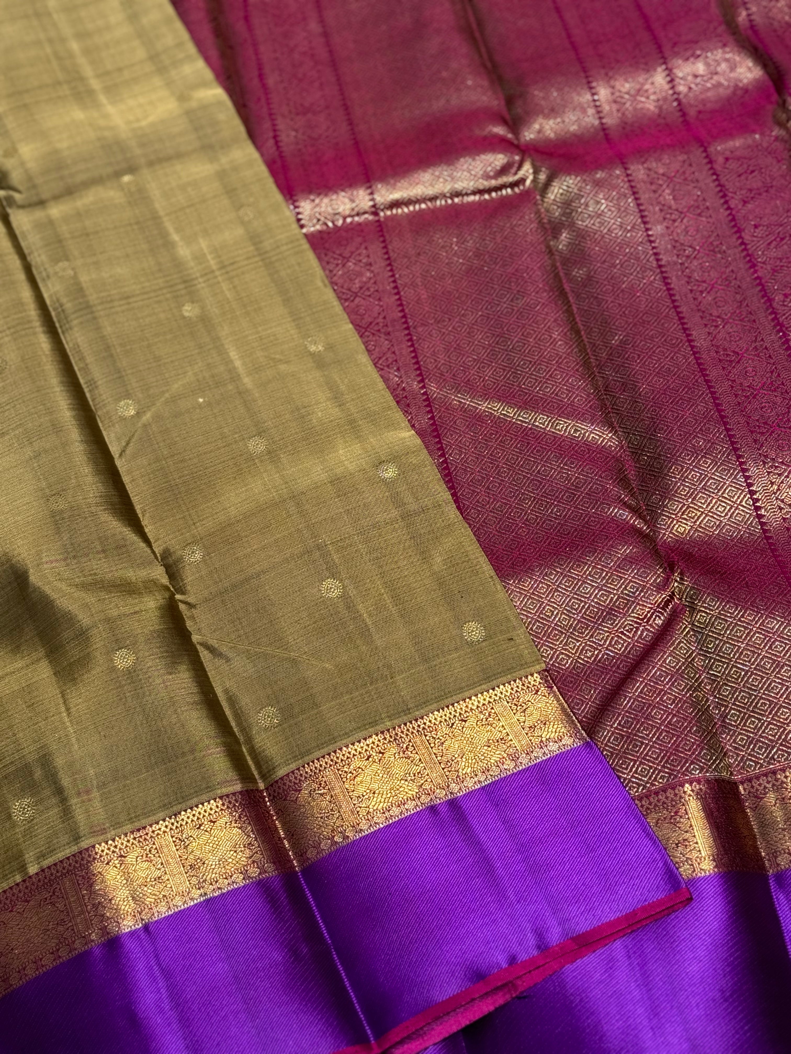 Molten gold Kanchivaram Silk Saree with Annam Kamalam Buttas