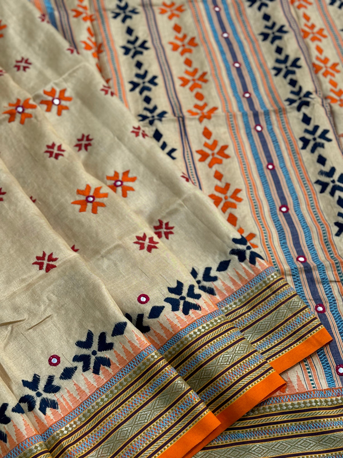 An exquisite handwoven vidharbha tussar silk saree with karvati kinar border intricately phulkari hand embroidered