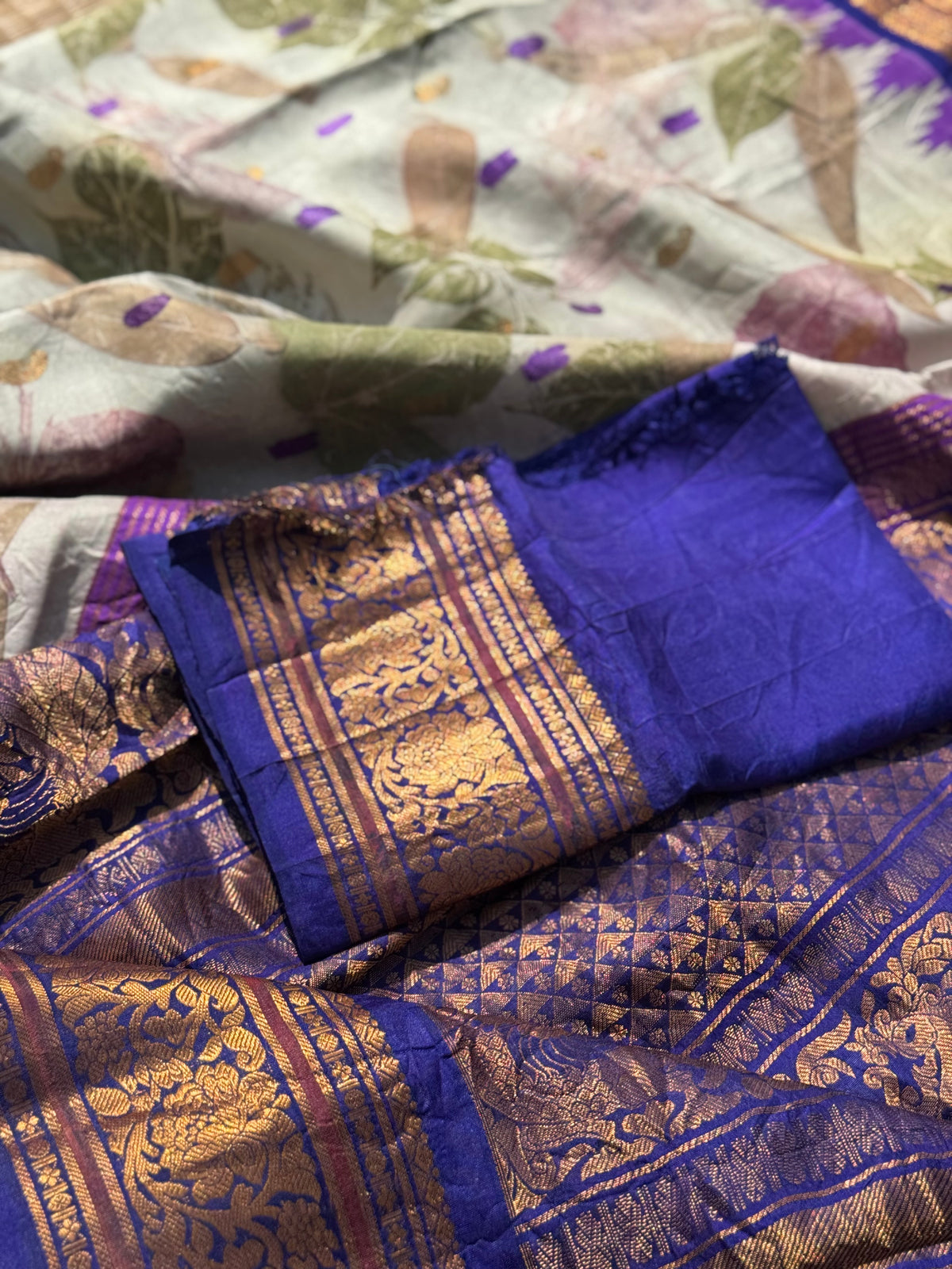 A gorgeous natural ecoprints done on ivory with violet kuttu gadwal silk saree (Copy)