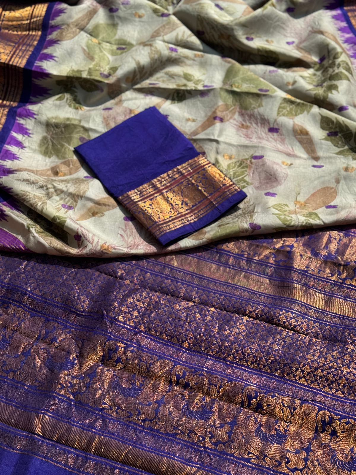A gorgeous natural ecoprints done on ivory with violet kuttu gadwal silk saree (Copy)