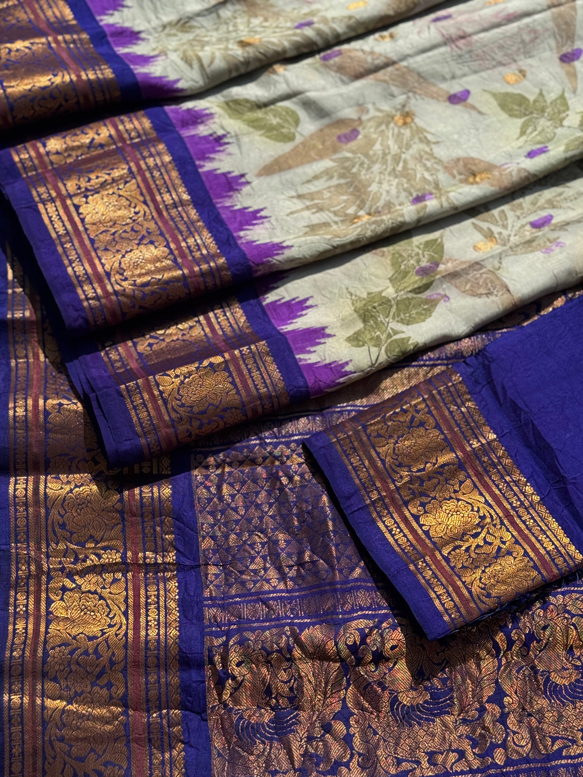 A gorgeous natural ecoprints done on ivory with violet kuttu gadwal silk saree (Copy)