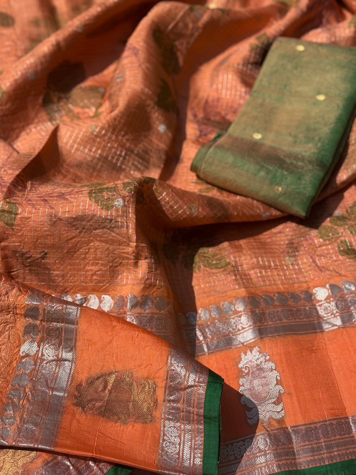 A pastel orange with shot fern green Natural Handmade Ecoprints Gadwal silk saree