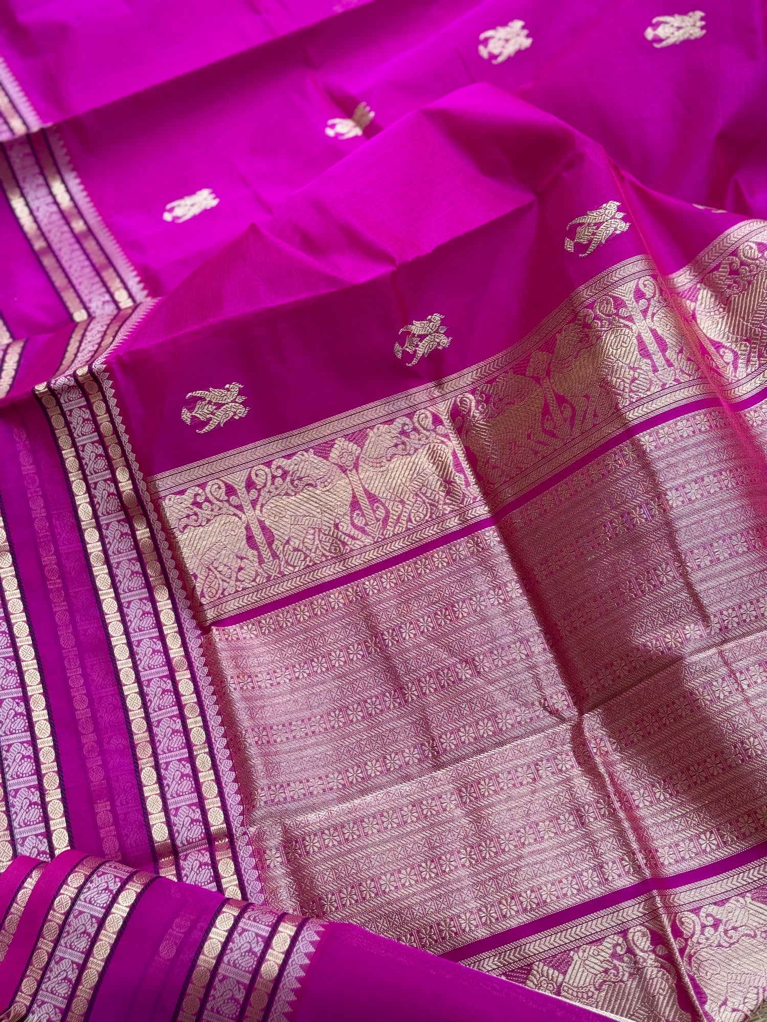 A gorgeous pattuRose pink shade handwoven zari checks with deer motifs Kanchi  silk cotton saree