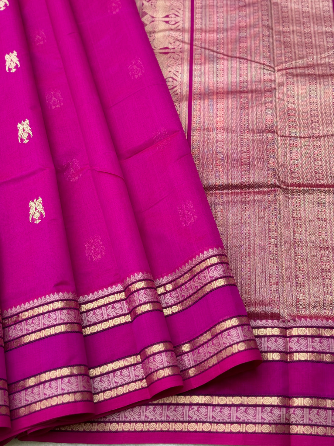 A gorgeous pattuRose pink shade handwoven zari checks with deer motifs Kanchi silk cotton saree