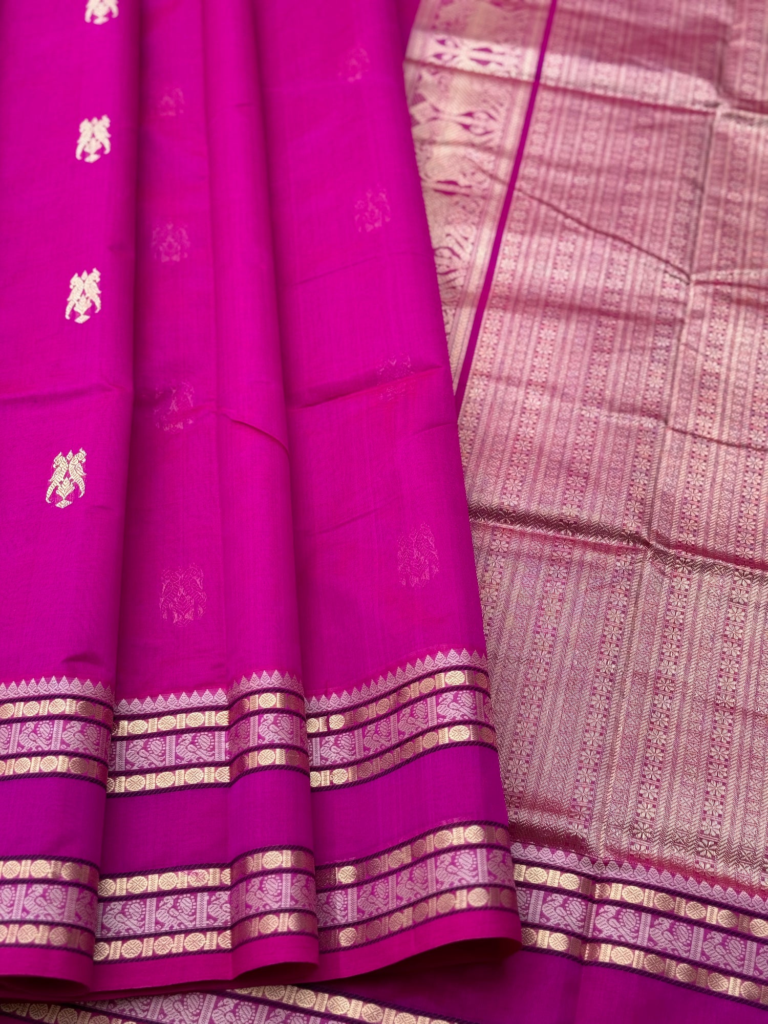 A gorgeous pattuRose pink shade handwoven zari checks with deer motifs Kanchi  silk cotton saree