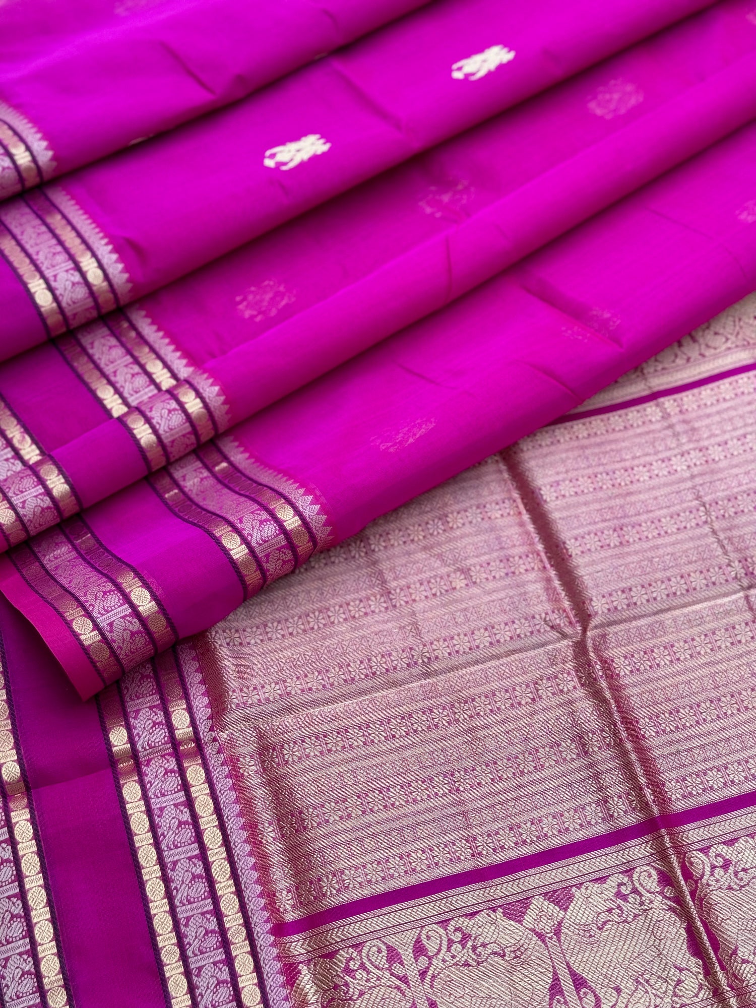 A gorgeous pattuRose pink shade handwoven zari checks with deer motifs Kanchi  silk cotton saree