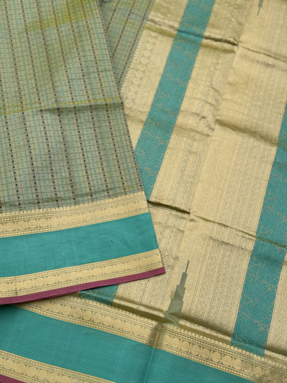 A gorgeous Pastel cyan green shade handwoven lakshadeepam kanchi silk cotton saree