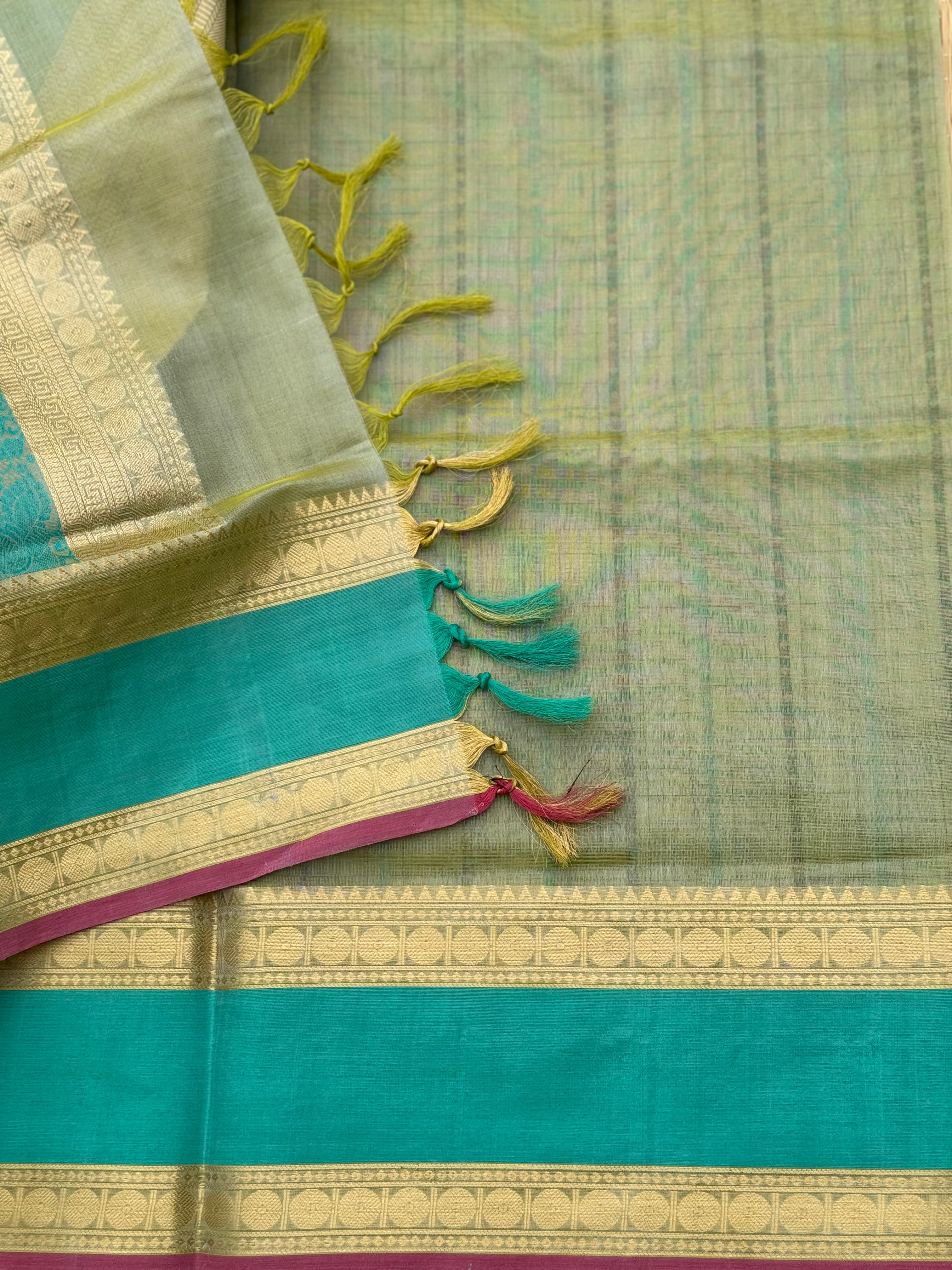 A gorgeous Pastel cyan green shade handwoven lakshadeepam kanchi silk cotton saree