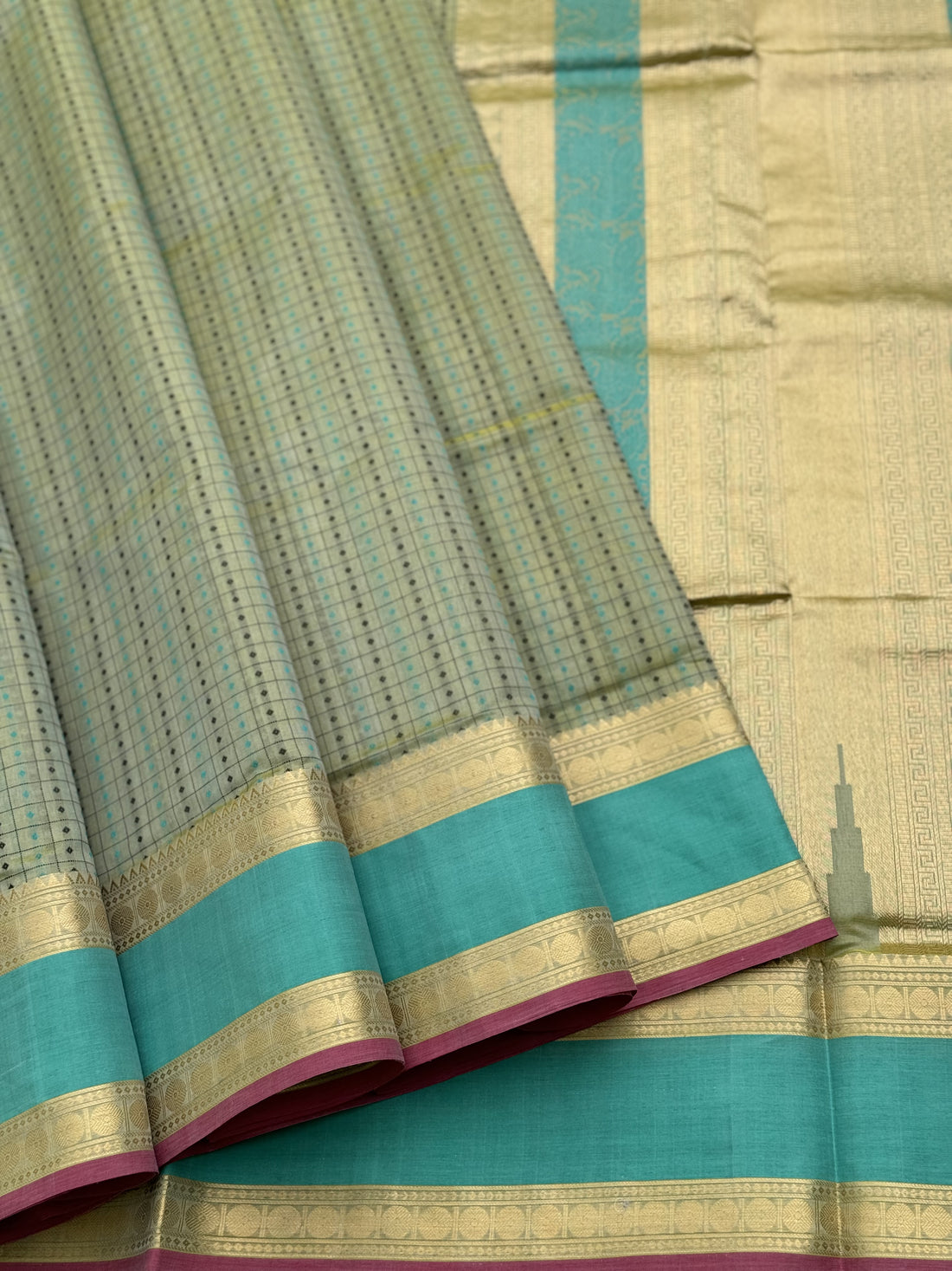 A gorgeous Pastel cyan green shade handwoven lakshadeepam kanchi silk cotton saree