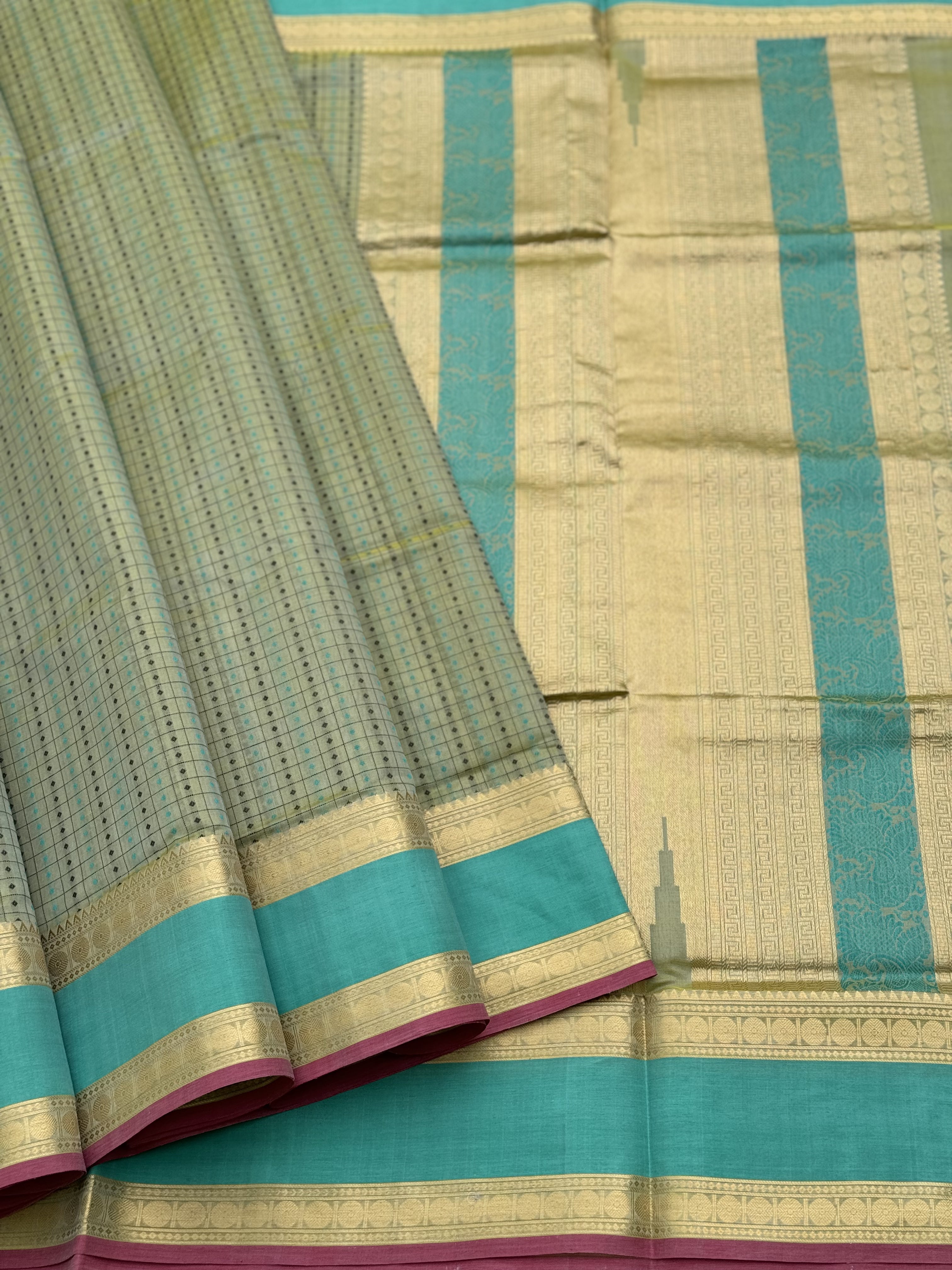 A gorgeous Pastel cyan green shade handwoven lakshadeepam kanchi silk cotton saree