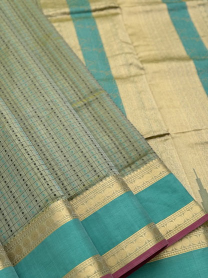 A gorgeous Pastel cyan green shade handwoven lakshadeepam kanchi silk cotton saree