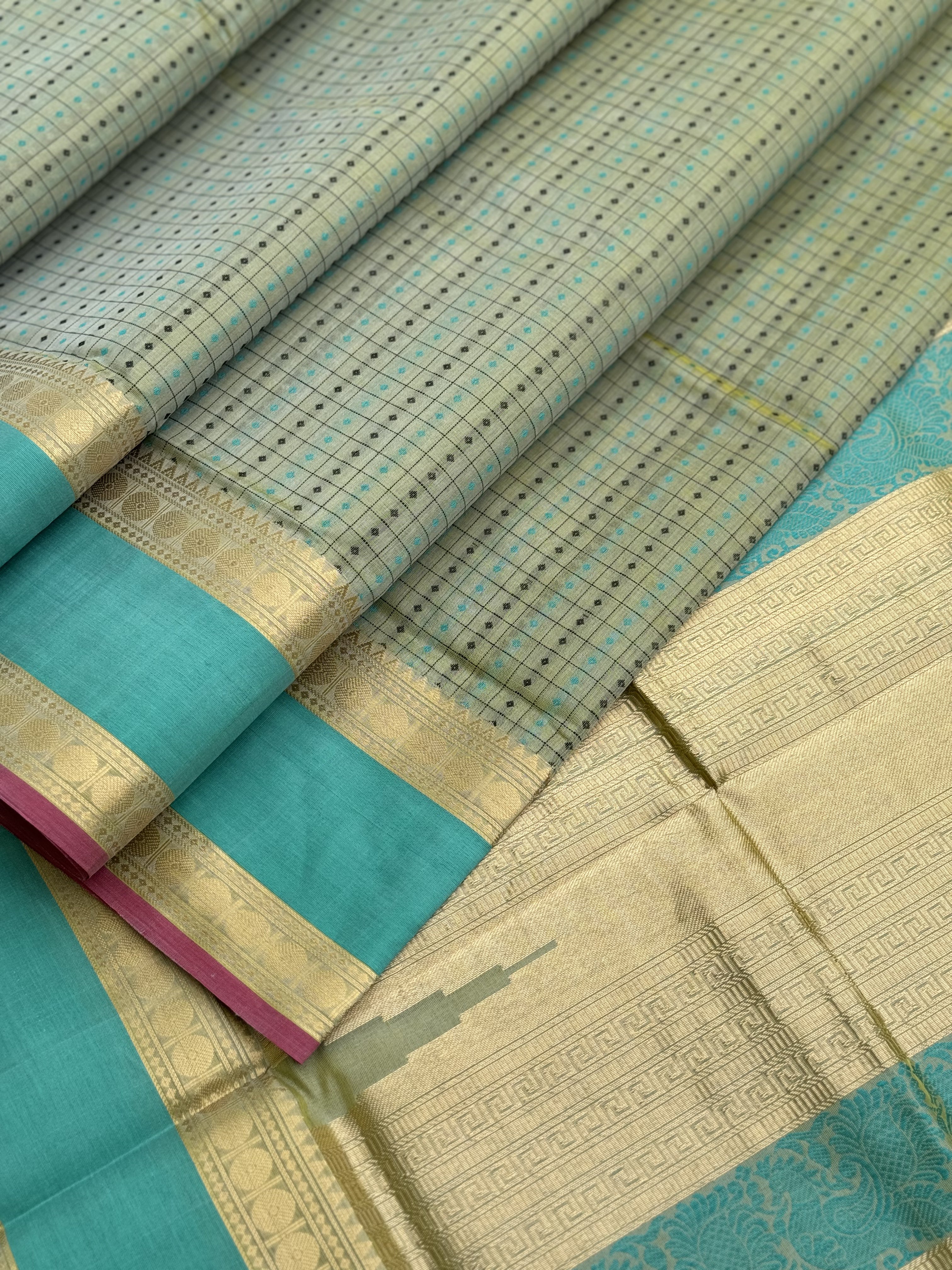 A gorgeous Pastel cyan green shade handwoven lakshadeepam kanchi silk cotton saree