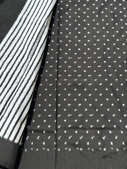 A double warp and weft tie dyed ikkat handwoven saree in pure mulberry silk with contemporary style of design