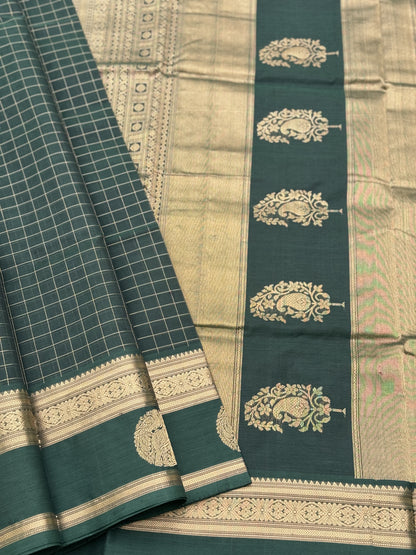 A gorgeous bottlegreen shade handwoven zari kattam Kanchi silk cotton saree