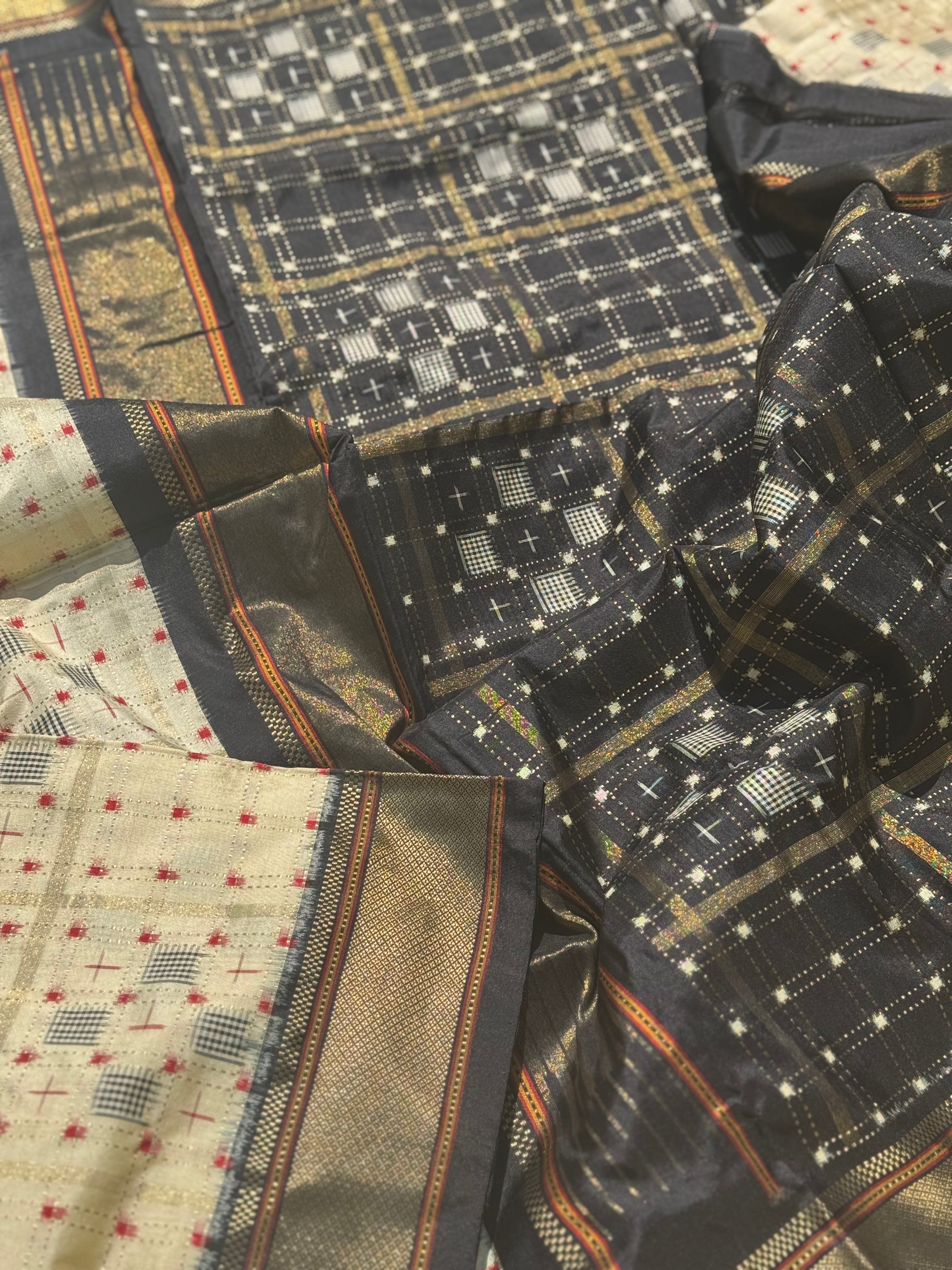 A masterpiece and mastercrafted piece weft single ikkat tie dyed handwoven saree in pure mulberry silk with traditional zari checkS