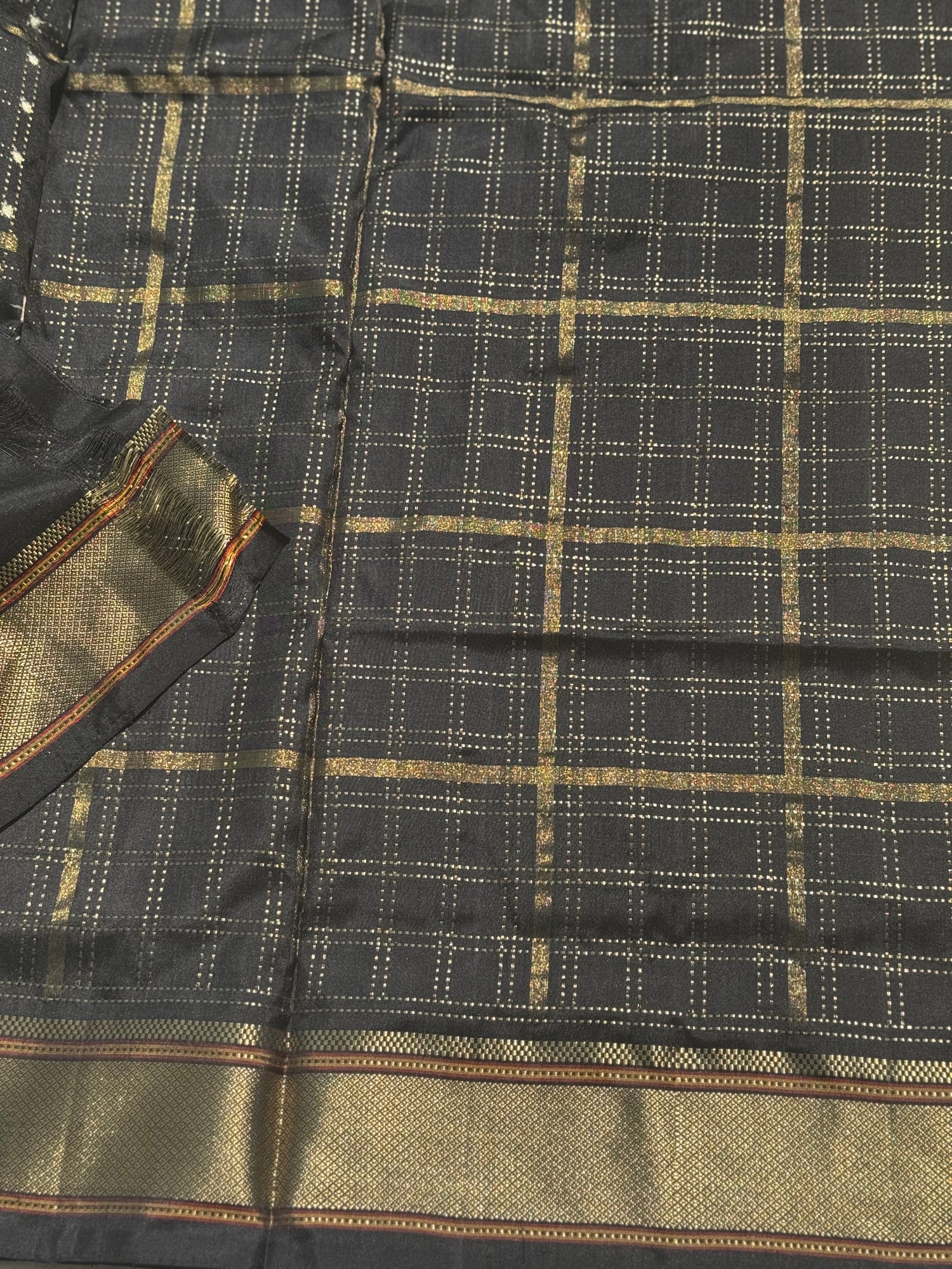 A masterpiece and mastercrafted piece weft single ikkat tie dyed handwoven saree in pure mulberry silk with traditional zari checkS