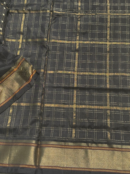 A masterpiece and mastercrafted piece weft single ikkat tie dyed handwoven saree in pure mulberry silk with traditional zari checkS