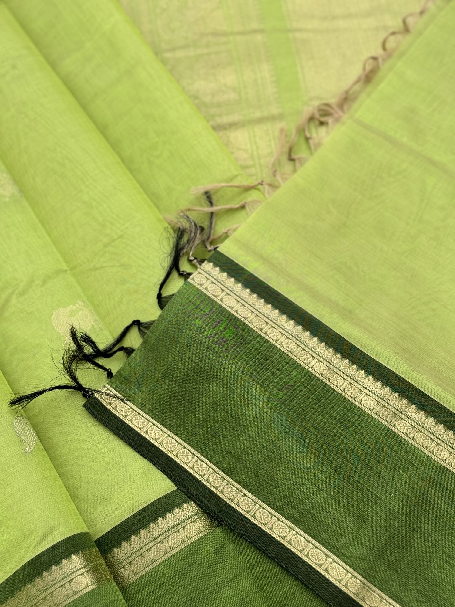 A gorgeous chartreuse green shade handwoven zari Kanchi silk cotton saree