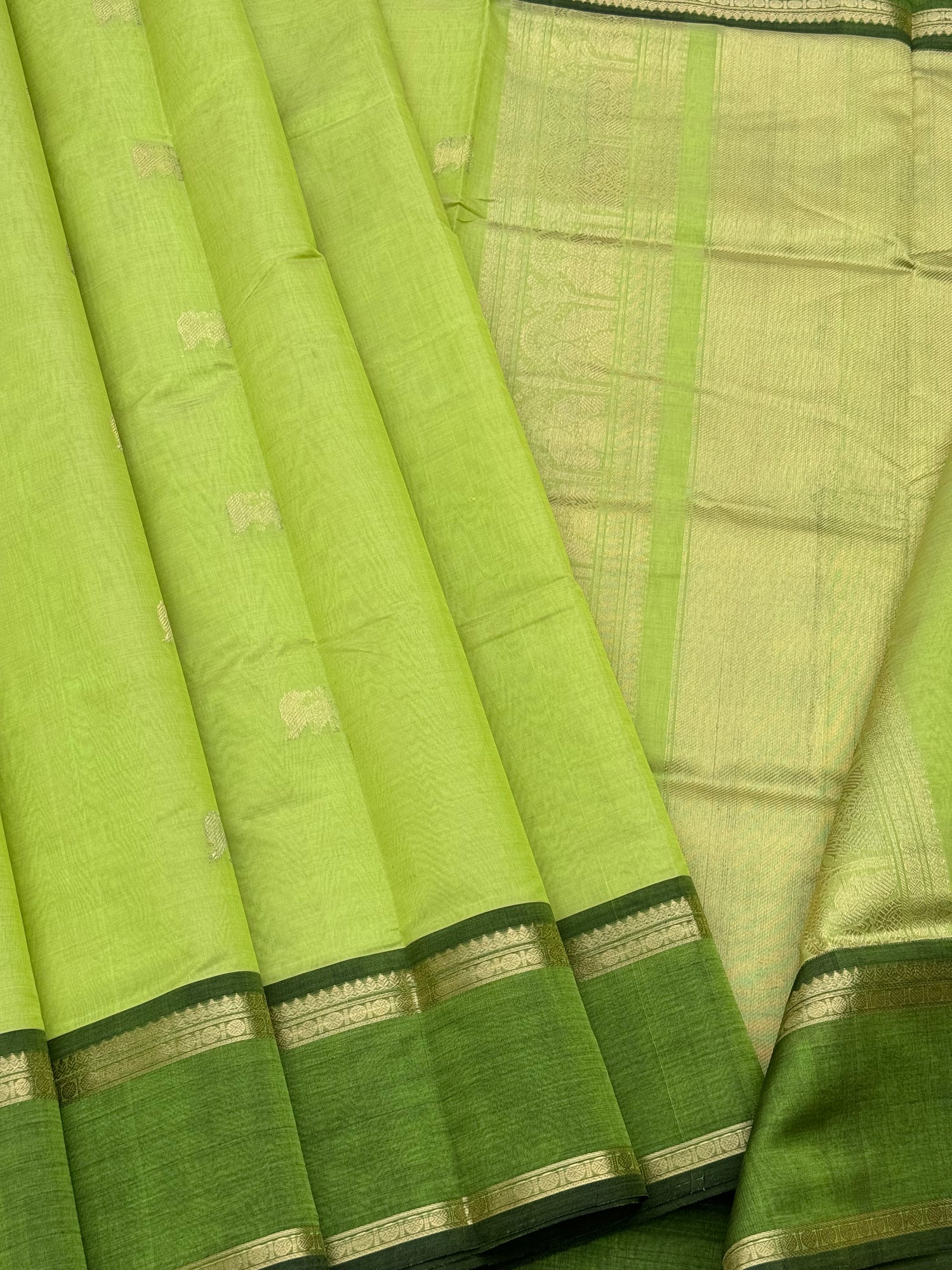 A gorgeous chartreuse green shade handwoven zari Kanchi silk cotton saree