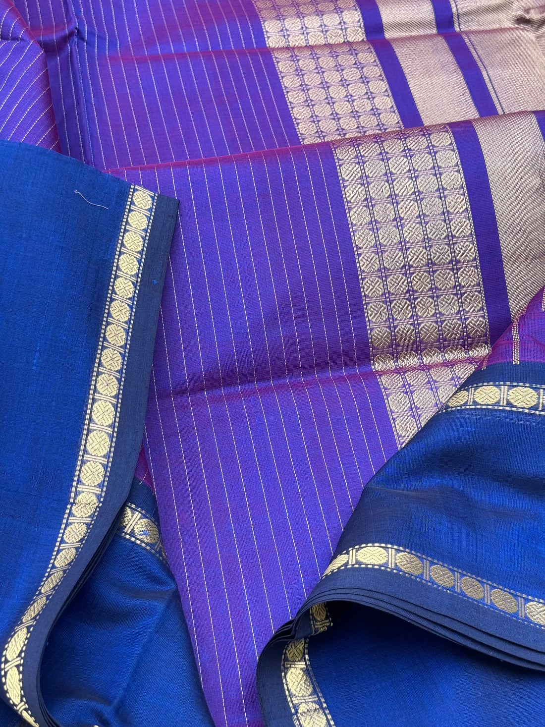 A gorgeous Purple blue shade handwoven zari muthuseer Kanchi silk cotton saree