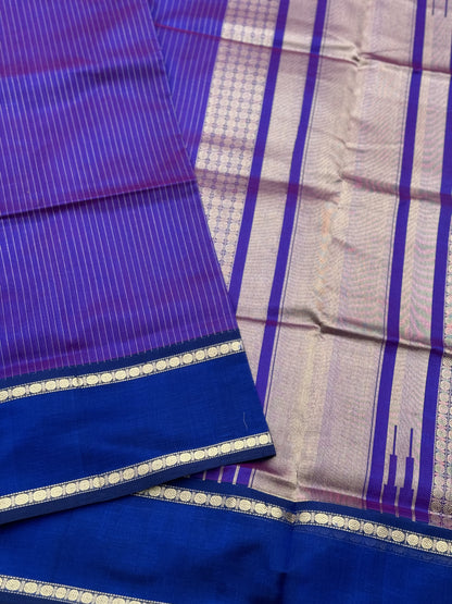 A gorgeous Purple blue shade handwoven zari muthuseer Kanchi silk cotton saree