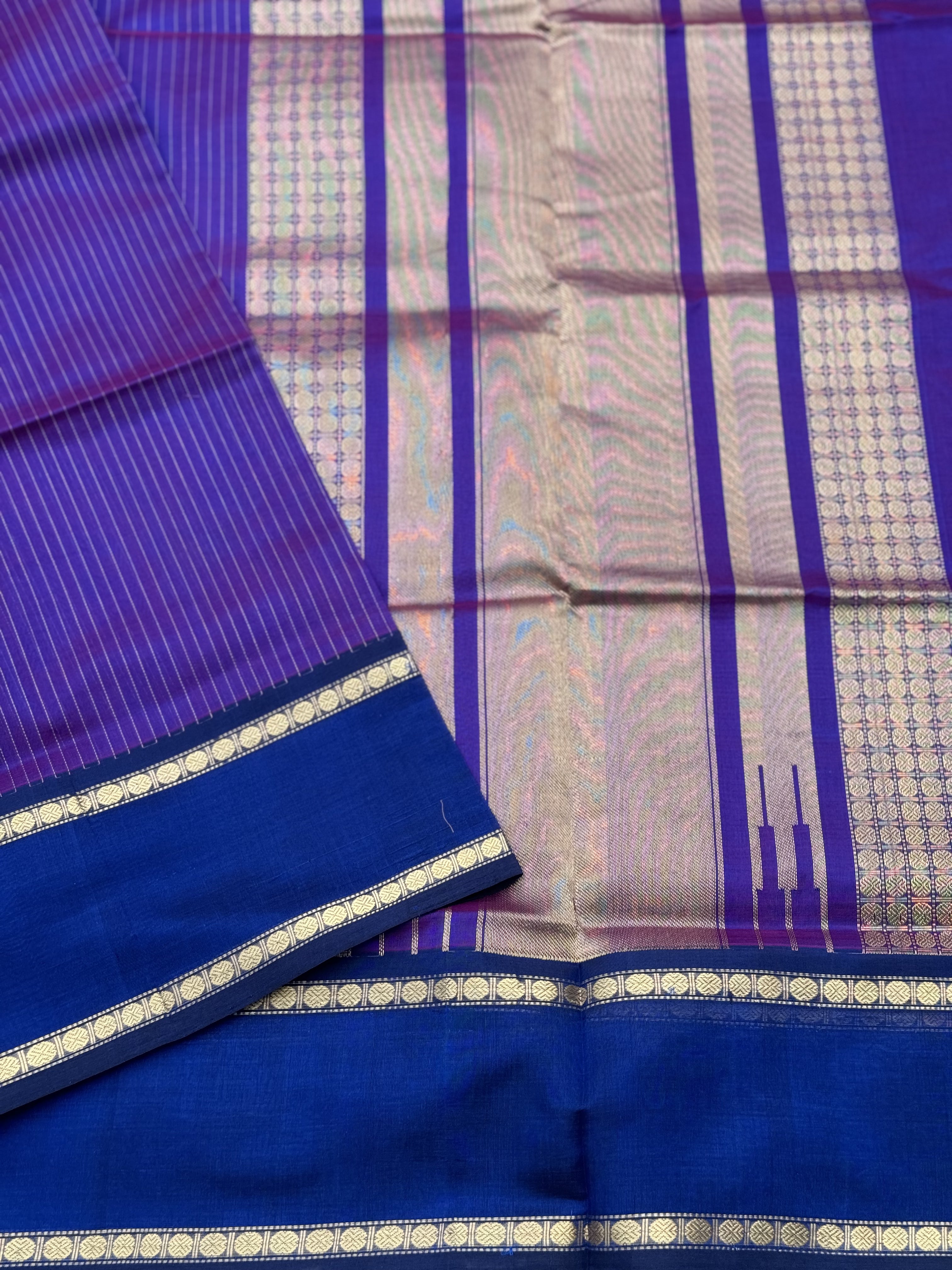 A gorgeous Purple blue shade handwoven zari muthuseer Kanchi silk cotton saree