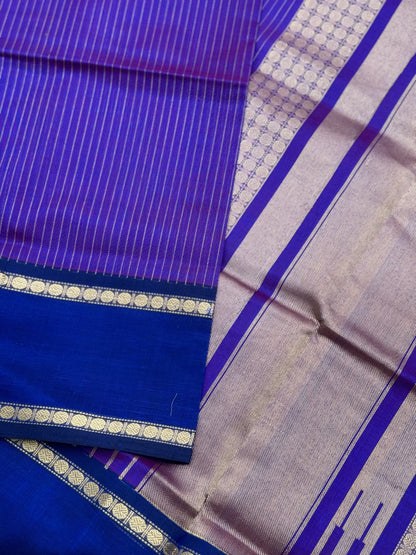 A gorgeous Purple blue shade handwoven zari muthuseer Kanchi silk cotton saree