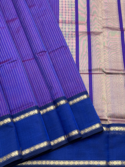 A gorgeous Purple blue shade handwoven zari muthuseer Kanchi silk cotton saree