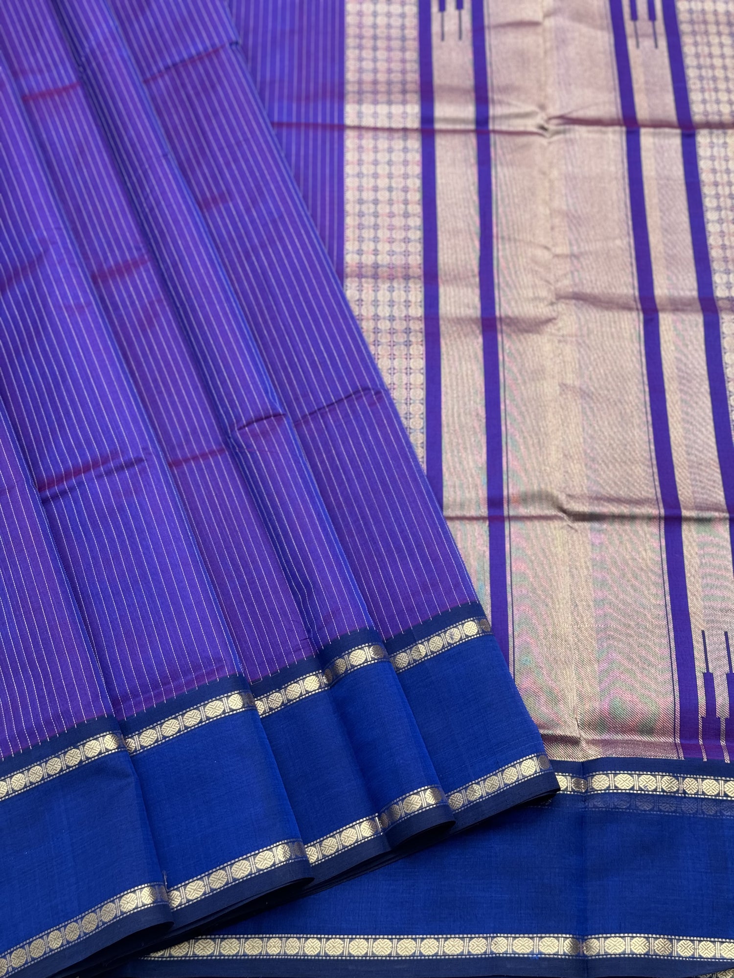 A gorgeous Purple blue shade handwoven zari muthuseer Kanchi silk cotton saree