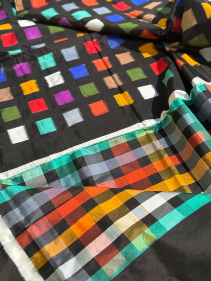 A contemporary take on solid block pattern multicolour double ikkat silk saree