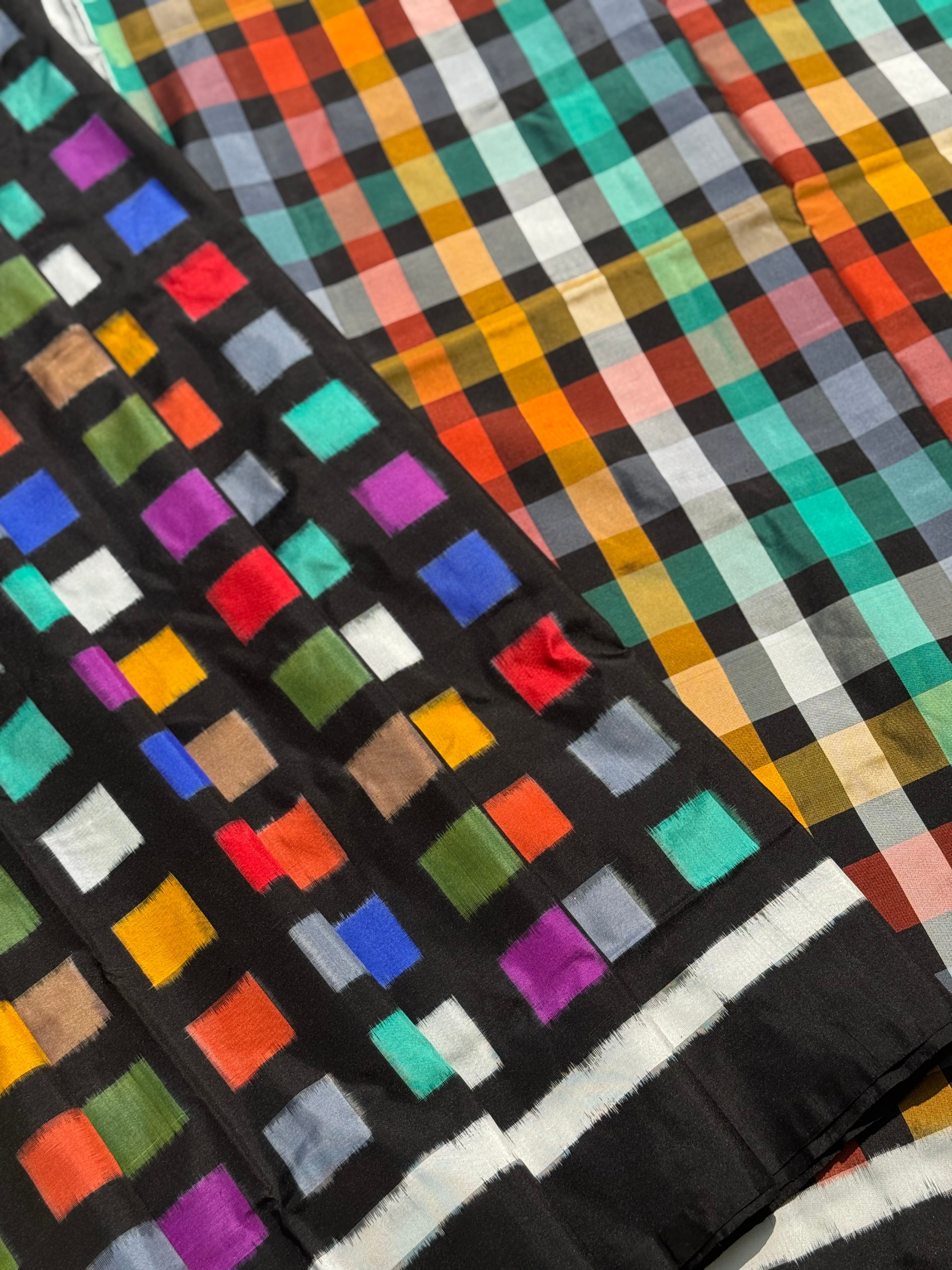 A contemporary take on solid block pattern multicolour double ikkat silk saree