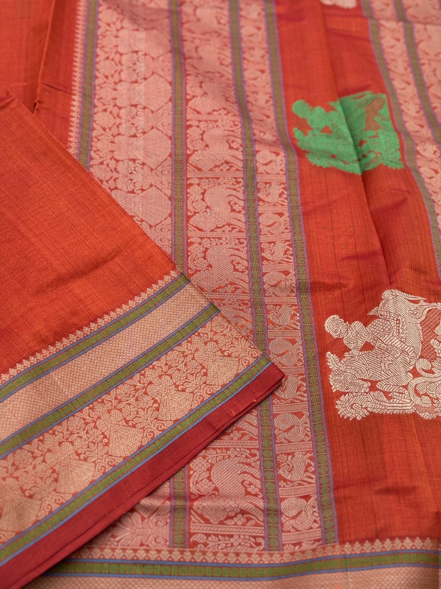 Gorgeous tangerine orange shade threadwork and zariwoven Kanchi silk Cotton Saree