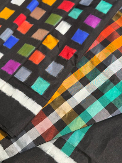 A contemporary take on solid block pattern multicolour double ikkat silk saree