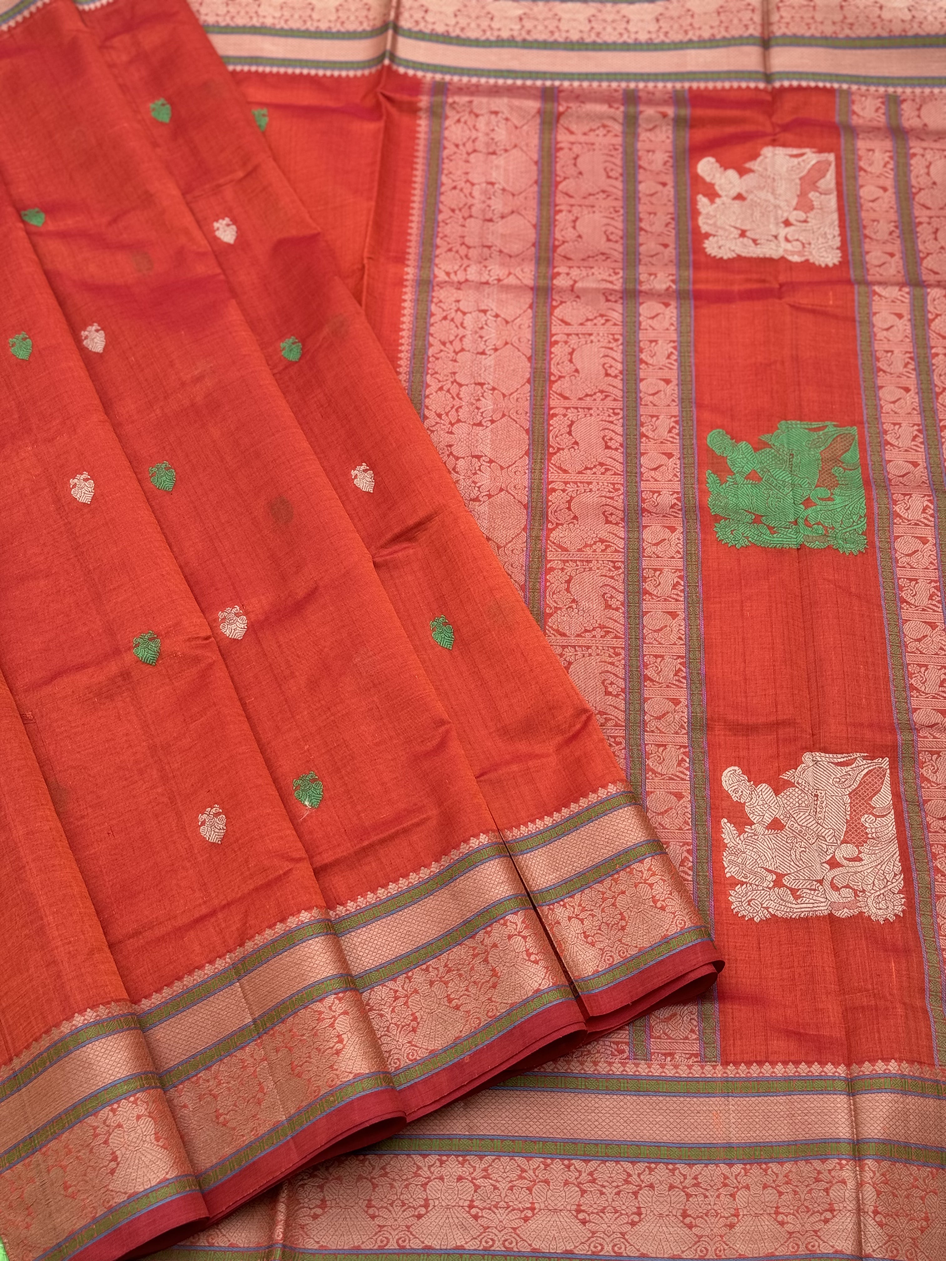 Gorgeous tangerine orange shade threadwork and zariwoven Kanchi silk Cotton Saree