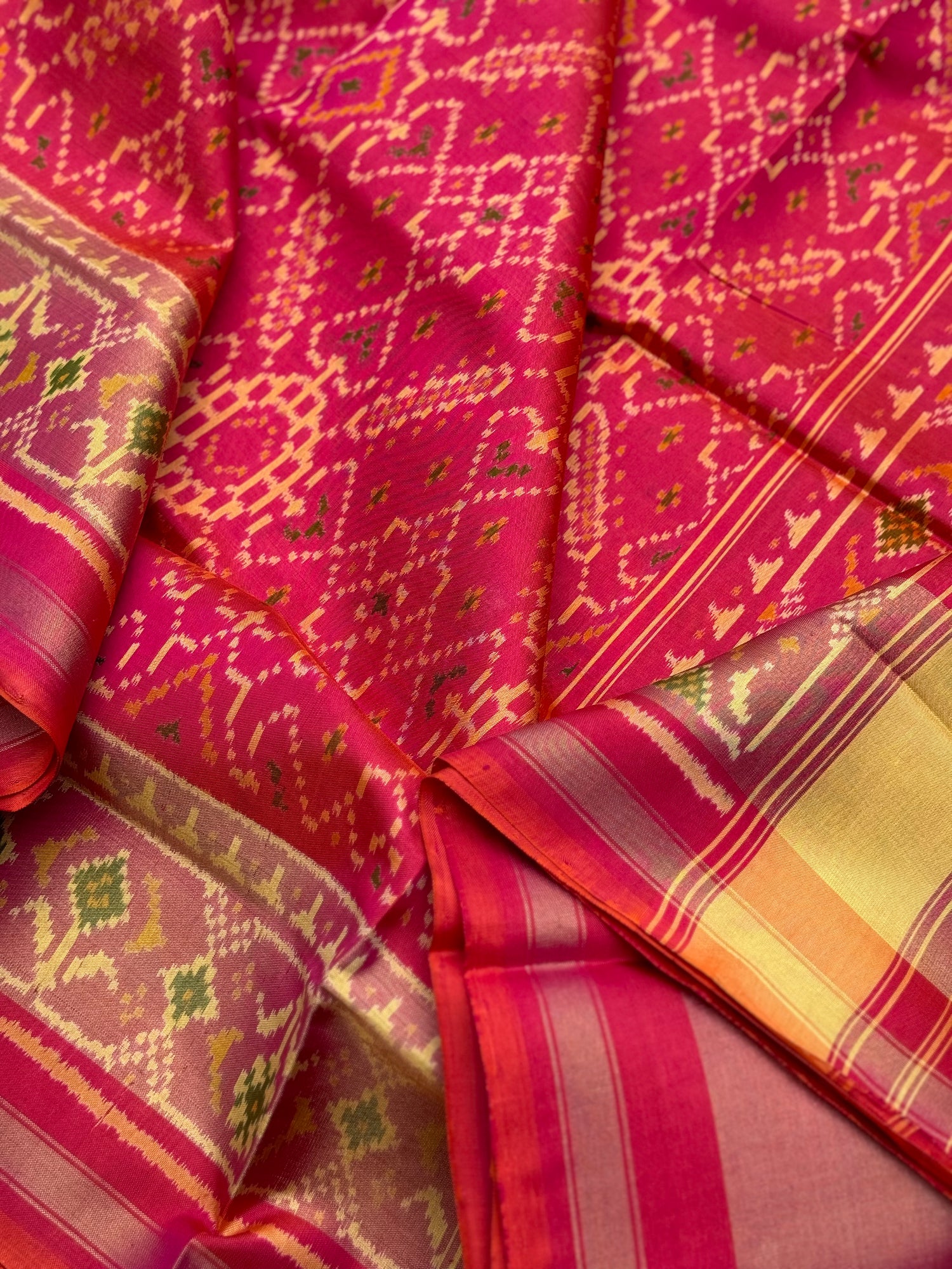 A gorgeous pink with red shade single ikkat patola silk SAREE