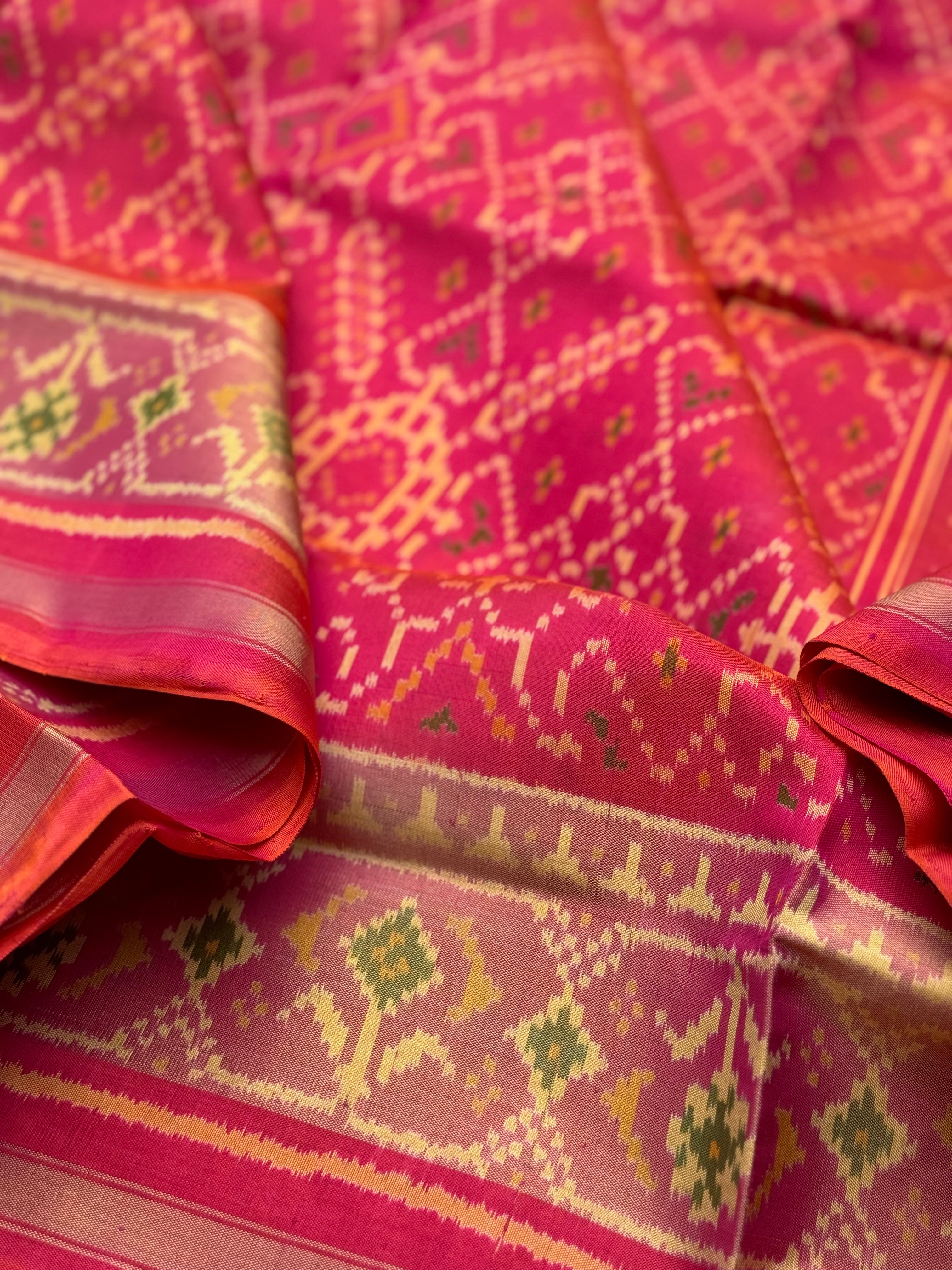 A gorgeous pink with red shade single ikkat patola silk SAREE