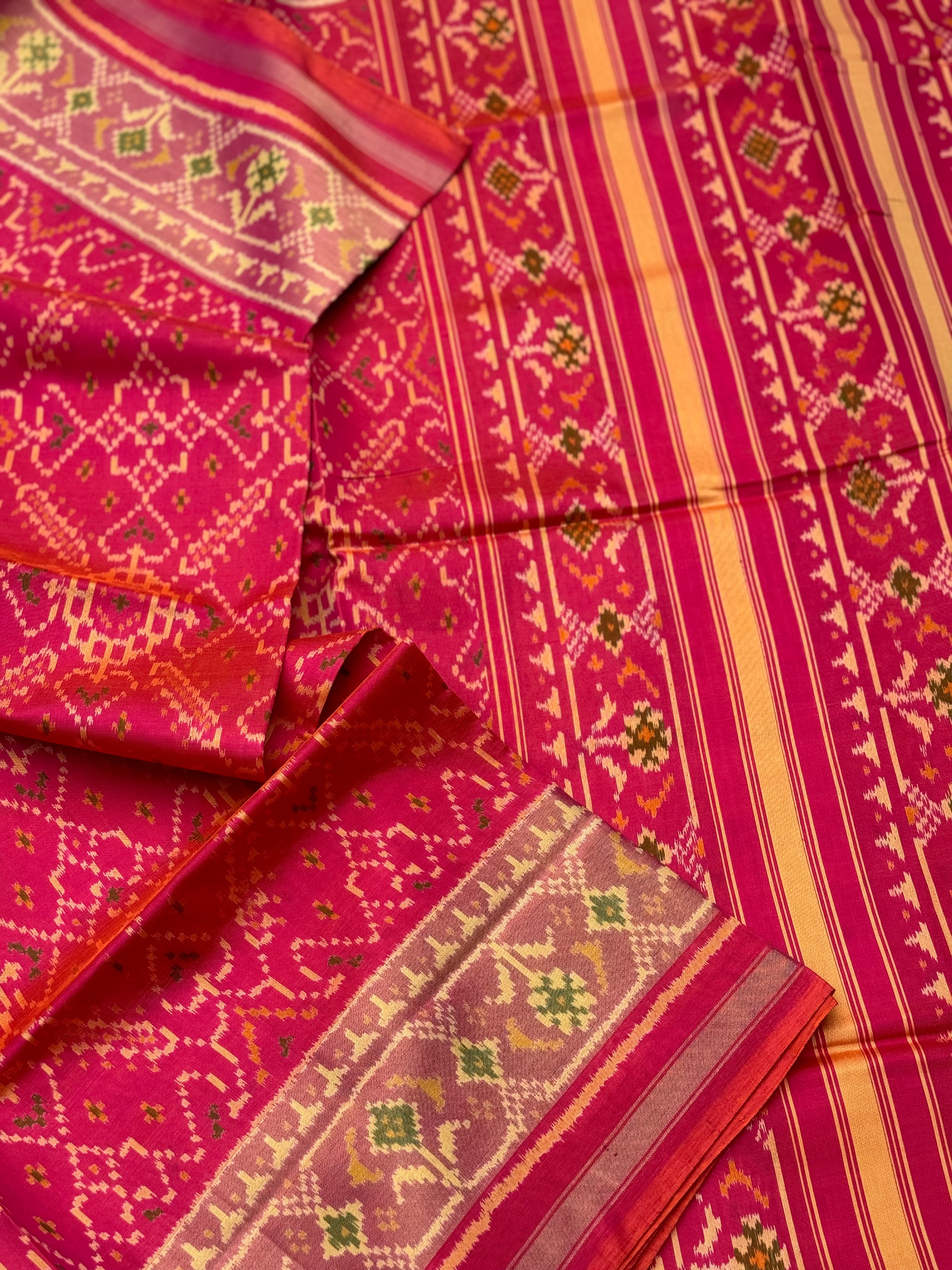 A gorgeous pink with red shade single ikkat patola silk SAREE