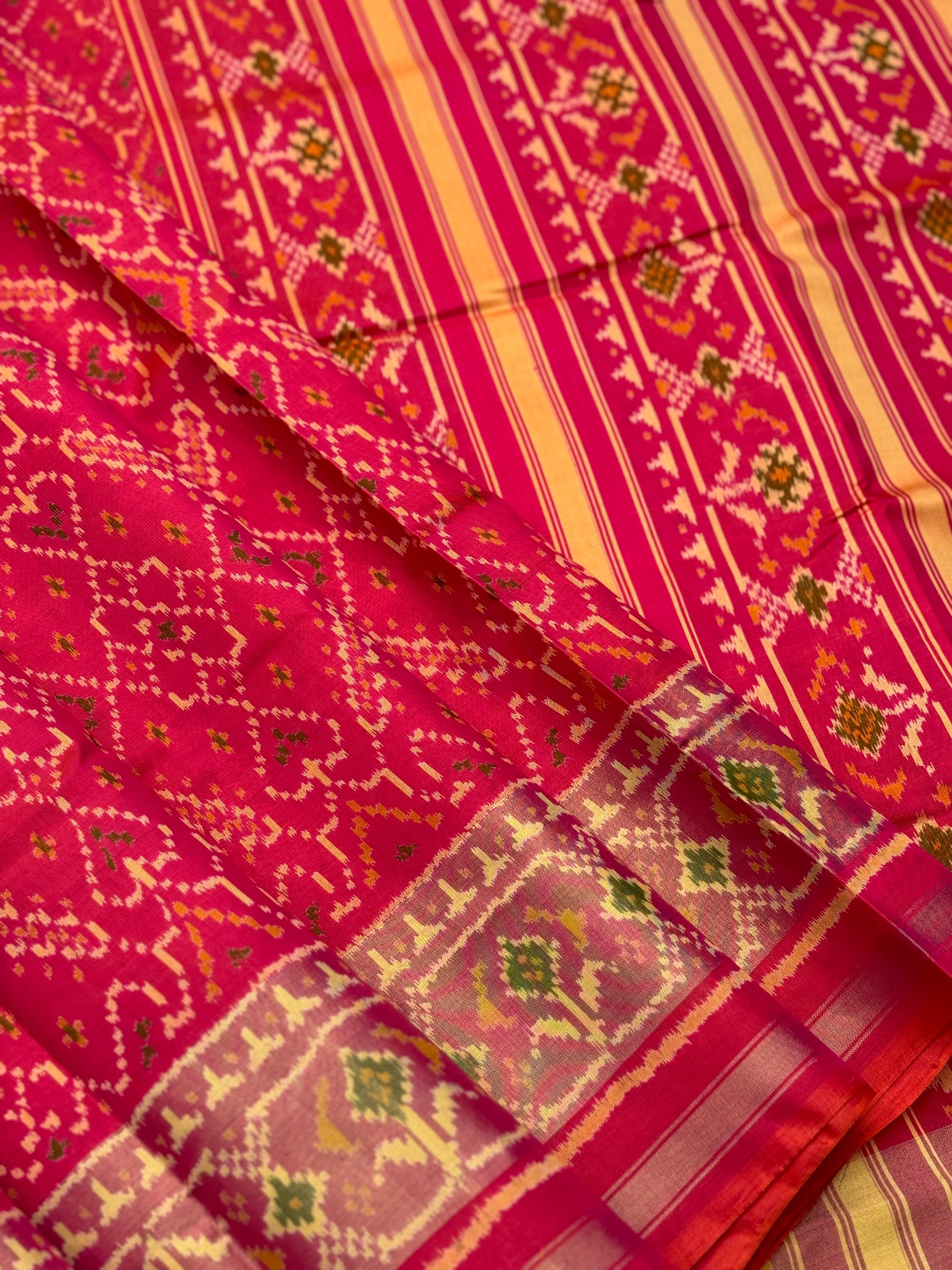 A gorgeous pink with red shade single ikkat patola silk SAREE