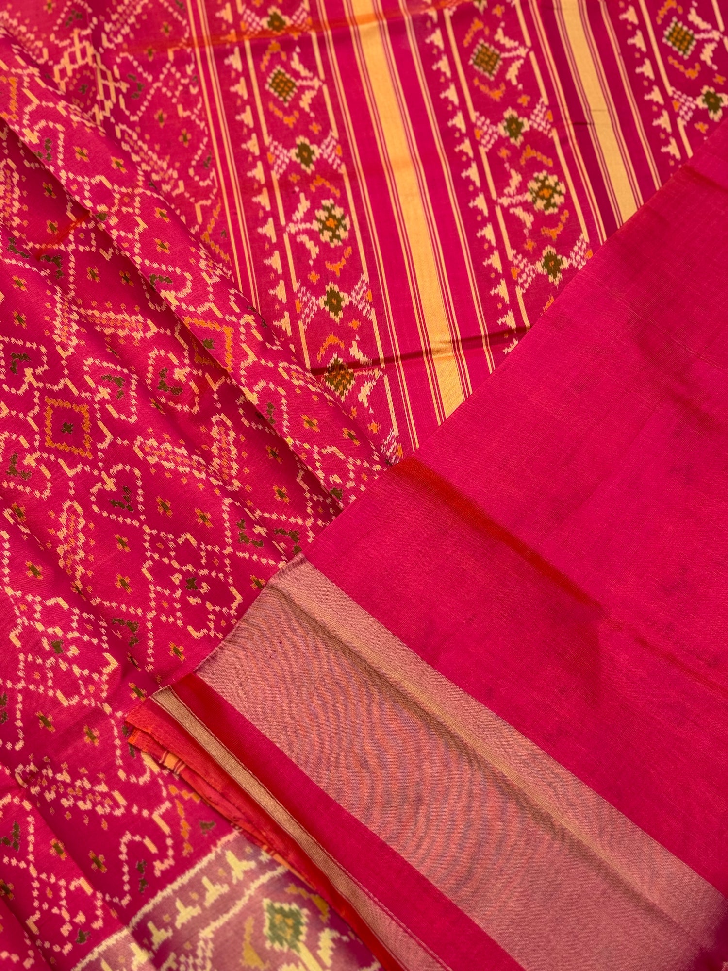 A gorgeous pink with red shade single ikkat patola silk SAREE