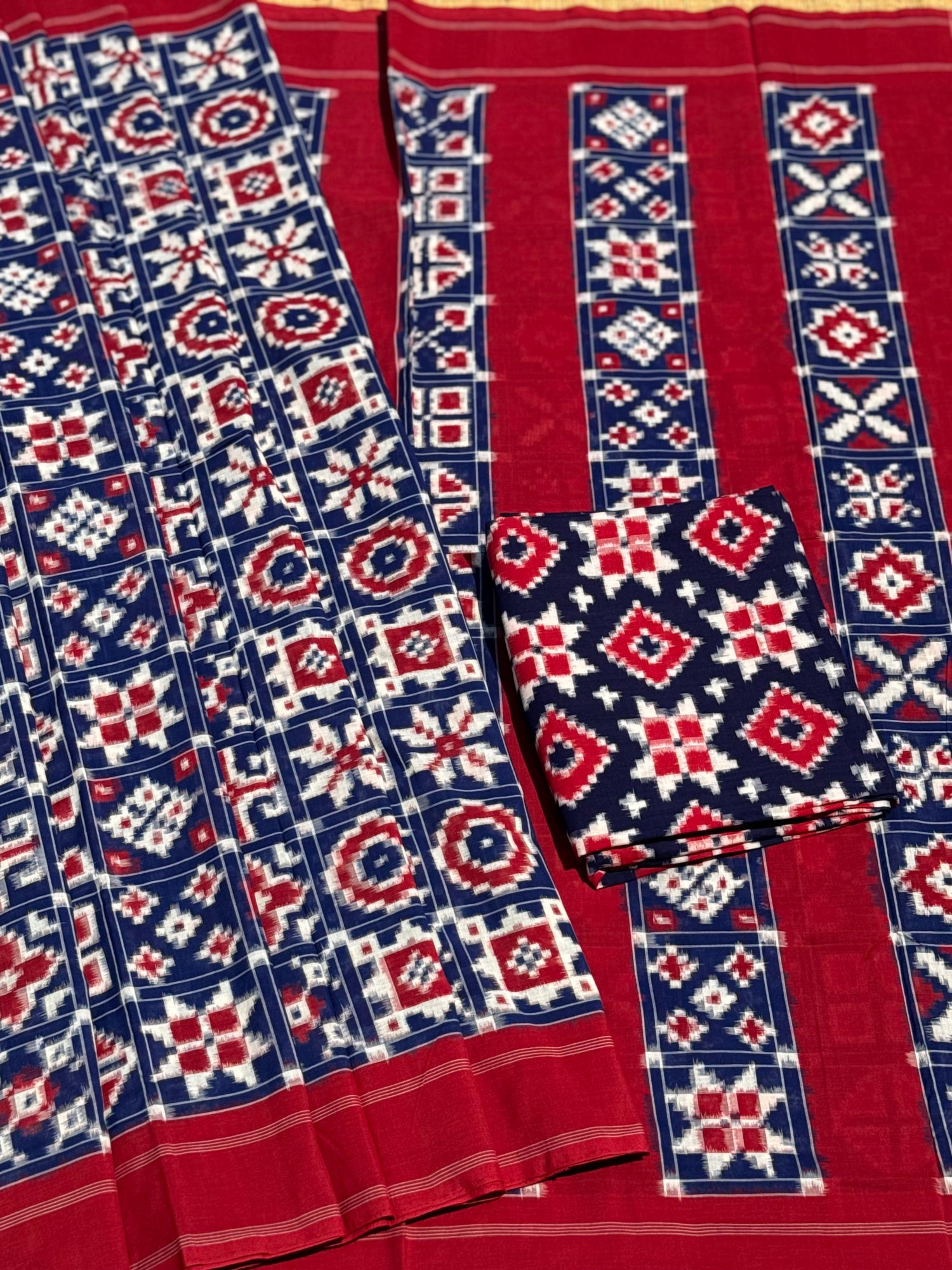Handwoven tie dyed 18 motif Telia Rumal double ikkat cotton saree