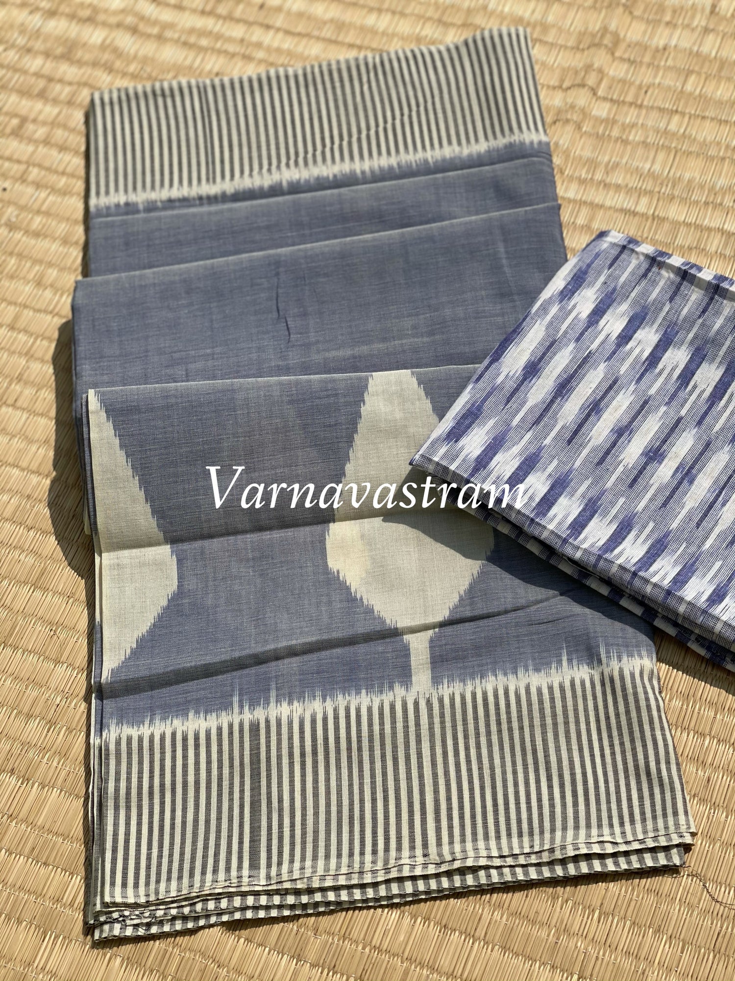 Gorgeous and contemporary powder blue with white weft ikkat cotton Saree