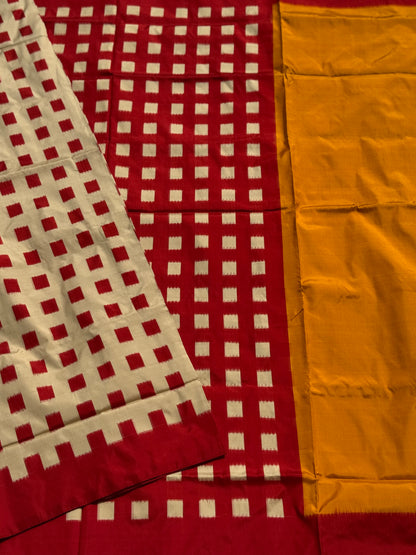 A contemporary take on solid block pattern double ikkat handwoven mulberry silk  saree