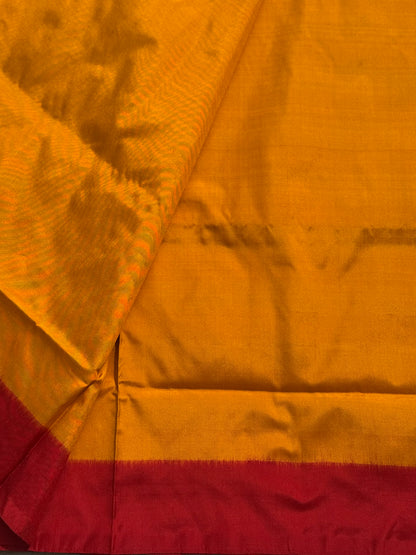 A contemporary take on solid block pattern double ikkat handwoven mulberry silk  saree