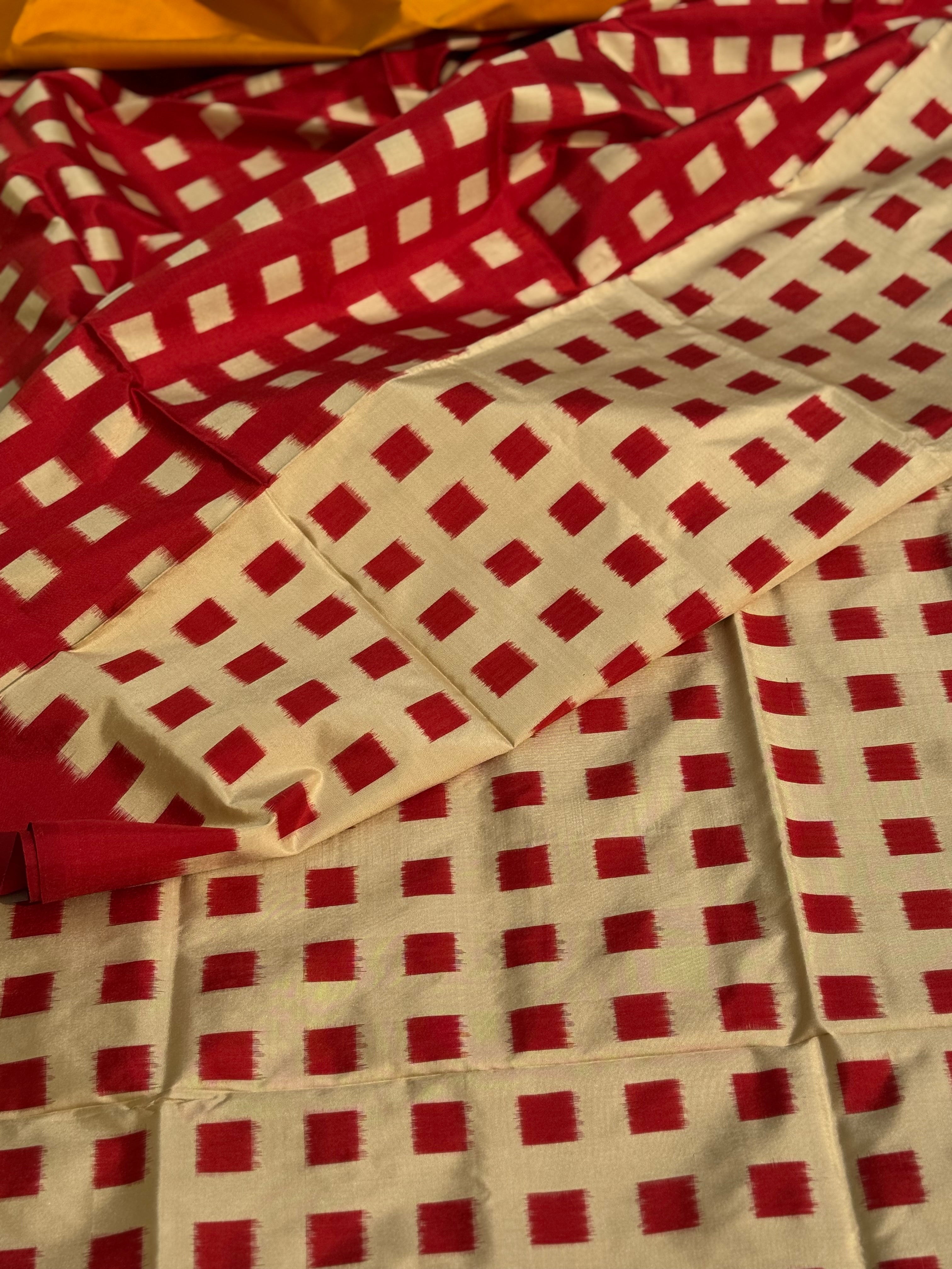 A contemporary take on solid block pattern double ikkat handwoven mulberry silk  saree