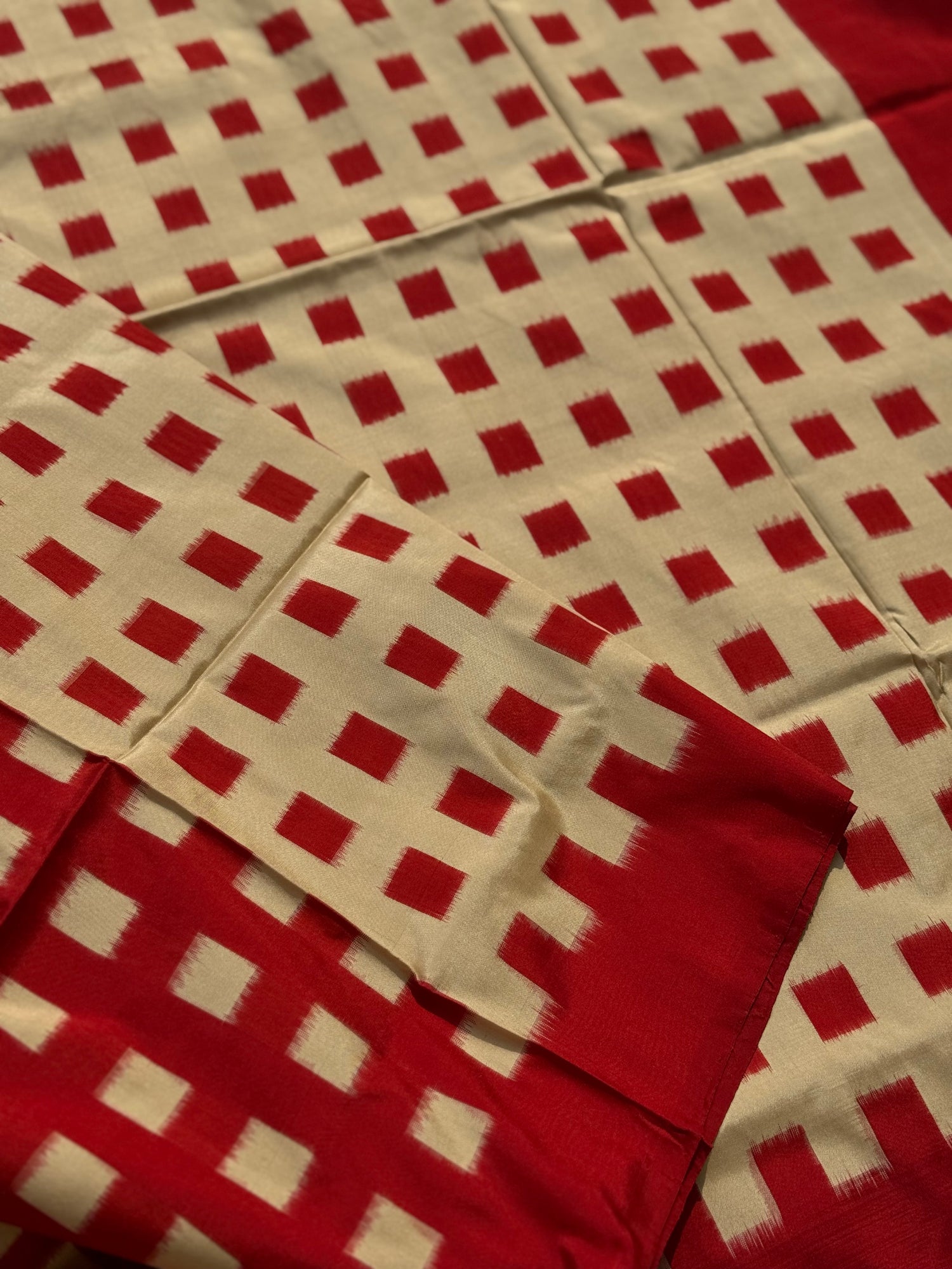 A contemporary take on solid block pattern double ikkat handwoven mulberry silk  saree