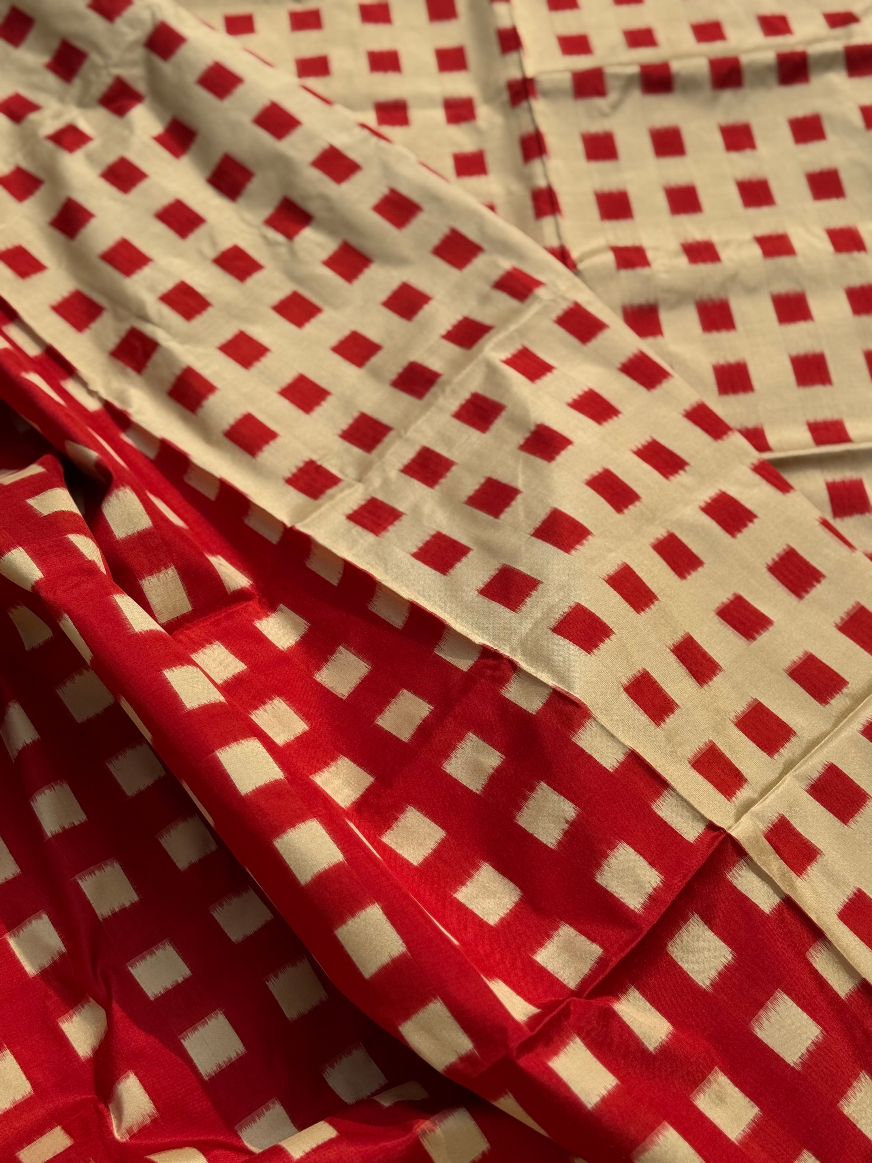 A contemporary take on solid block pattern double ikkat handwoven mulberry silk  saree